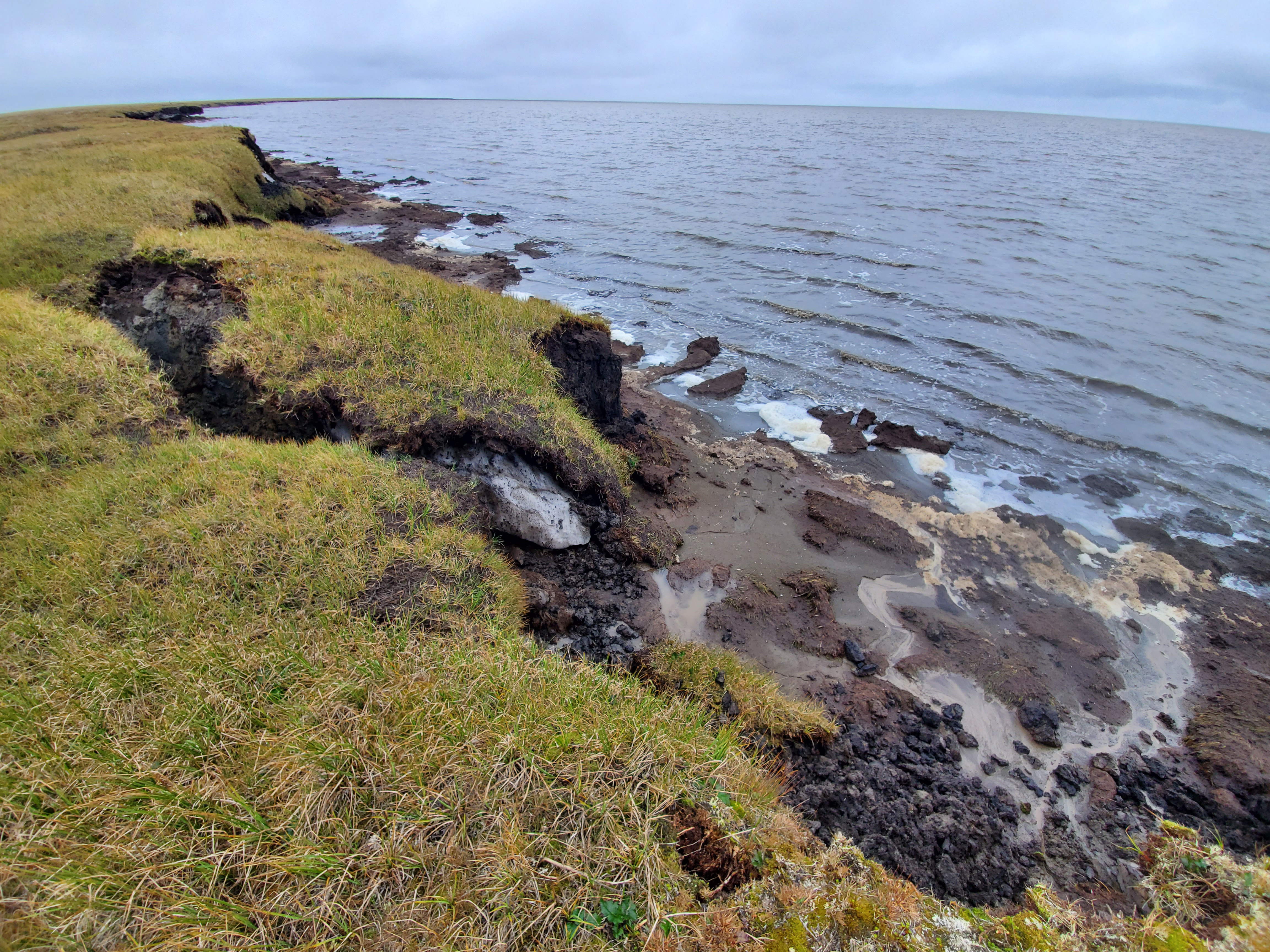 Coastal erosion exposes the permafrost along the coast of Utqiagvik, Alaska.